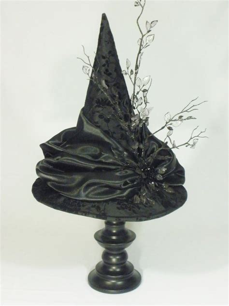 Elevate your style with the black lxce witch hat